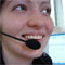 girl talking into headset: help desk operator